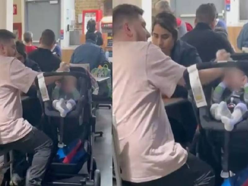 Hombre golpea la cabeza de un bebé con un biberón